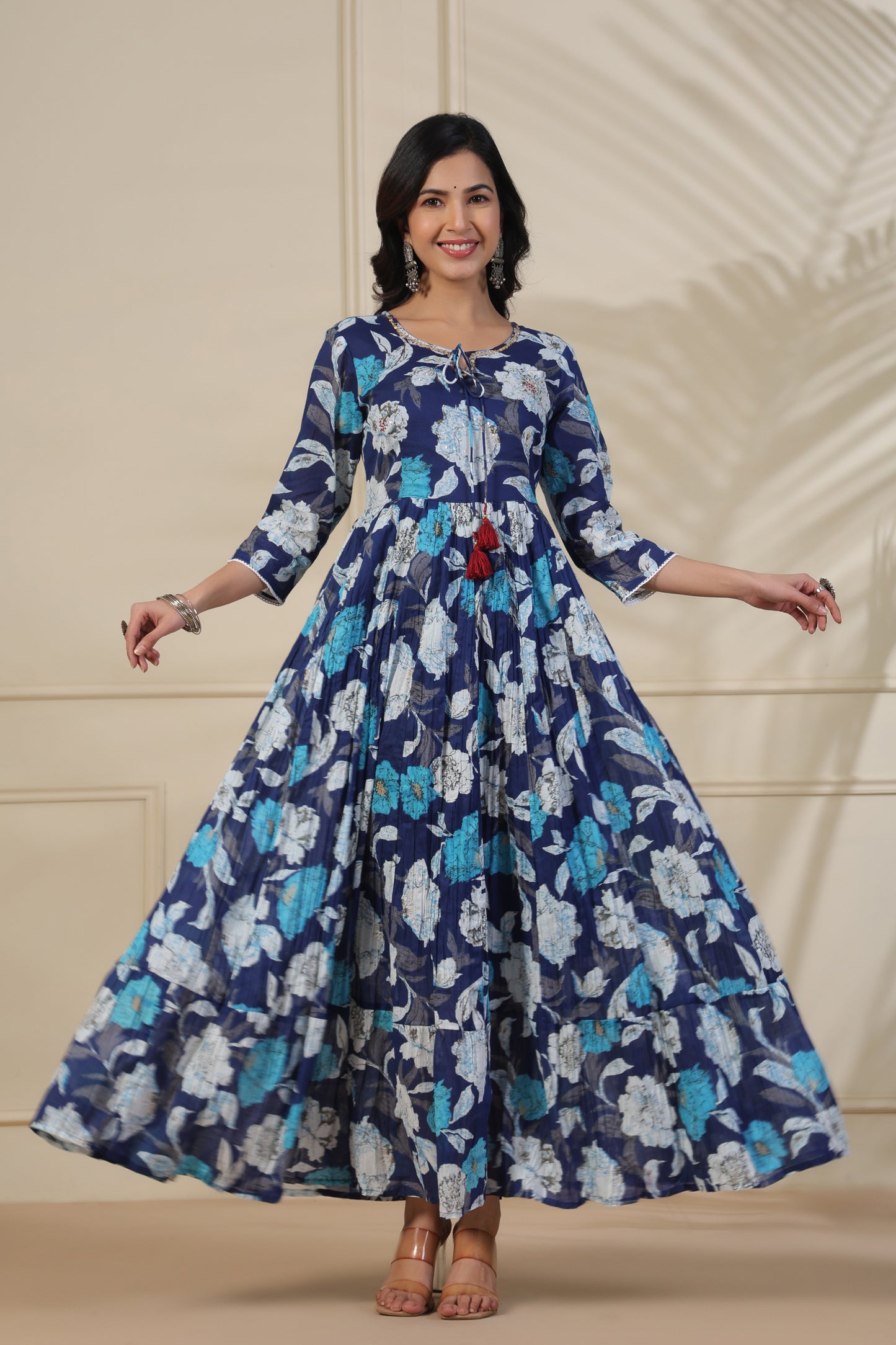 PUKHYA BLUE PRINTED FLARED GOWN WITH ADDA WORK, LACE AND DORI, TUSSLE