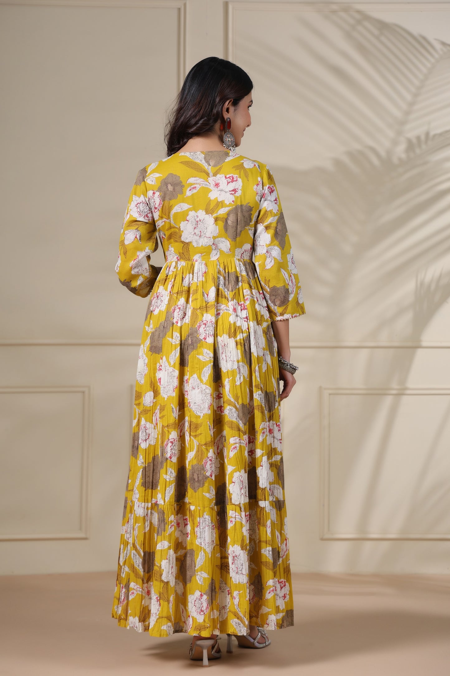 PUKHYA MUSTARD PRINTED FLARED GOWN WITH ADDA WORK, LACE AND DORI, TUSSLE