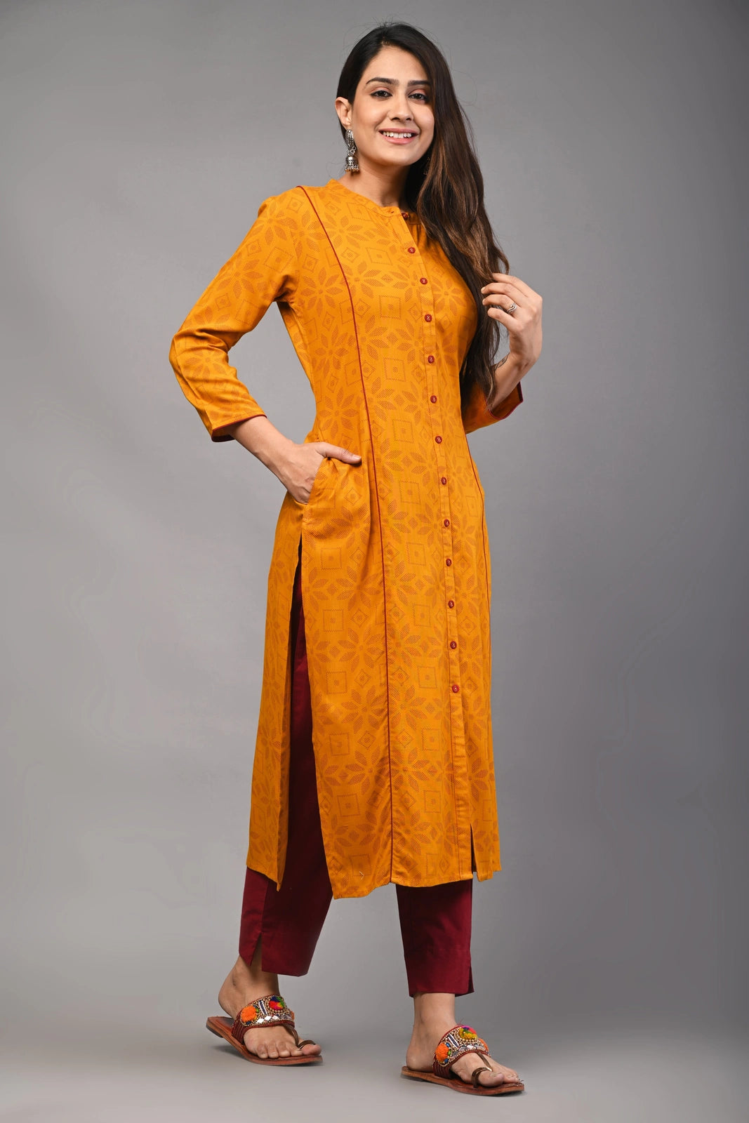 PUKHYA WOMEN'S MUSTARD PRINTED STRAIGHT KURTA